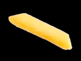 shred of Tillamook cheddar cheese